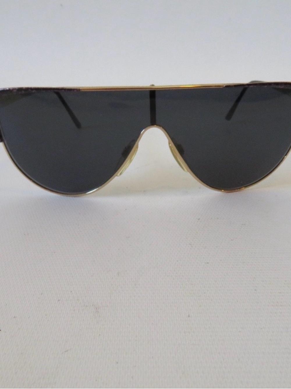 Gucci Oversized Shield Sunglasses in Gold and Black